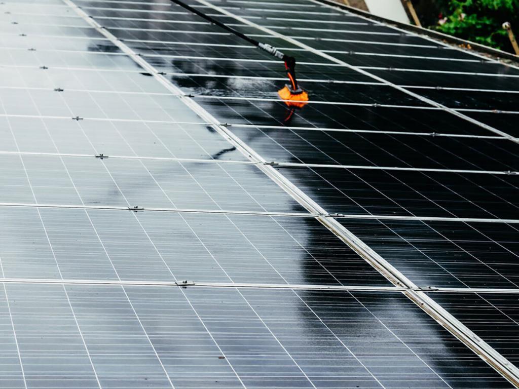 washing roof solar panels