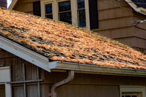 How to clean rain gutters