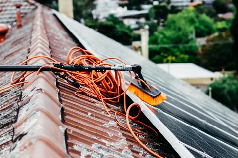 Cleaning a Melbourne roof with solar panels