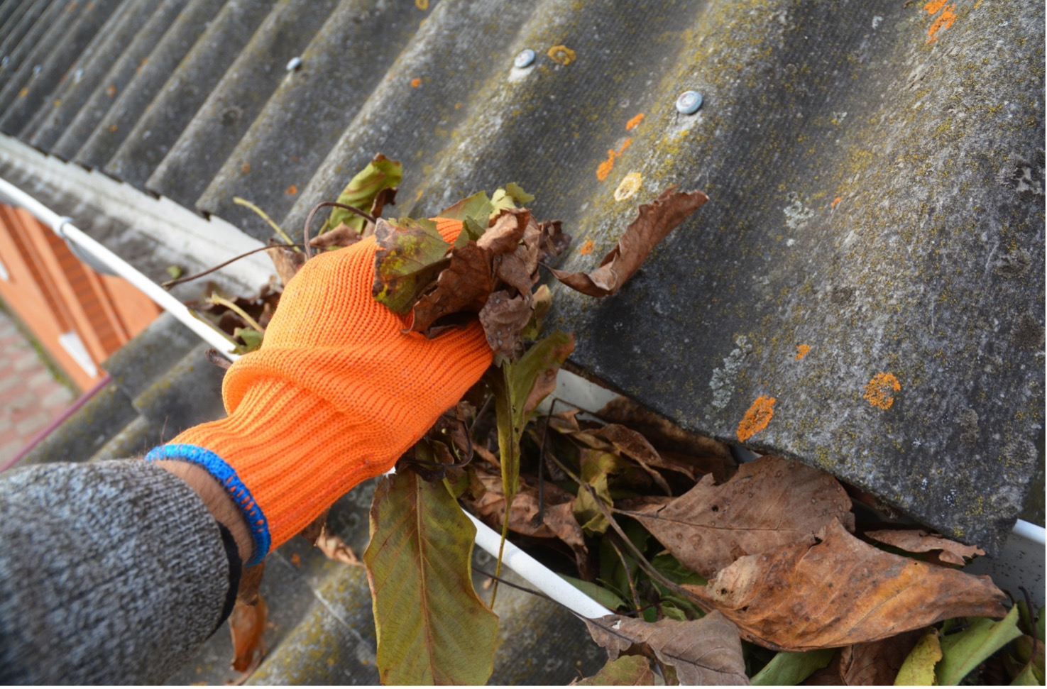 Clearing debris from a gutter
