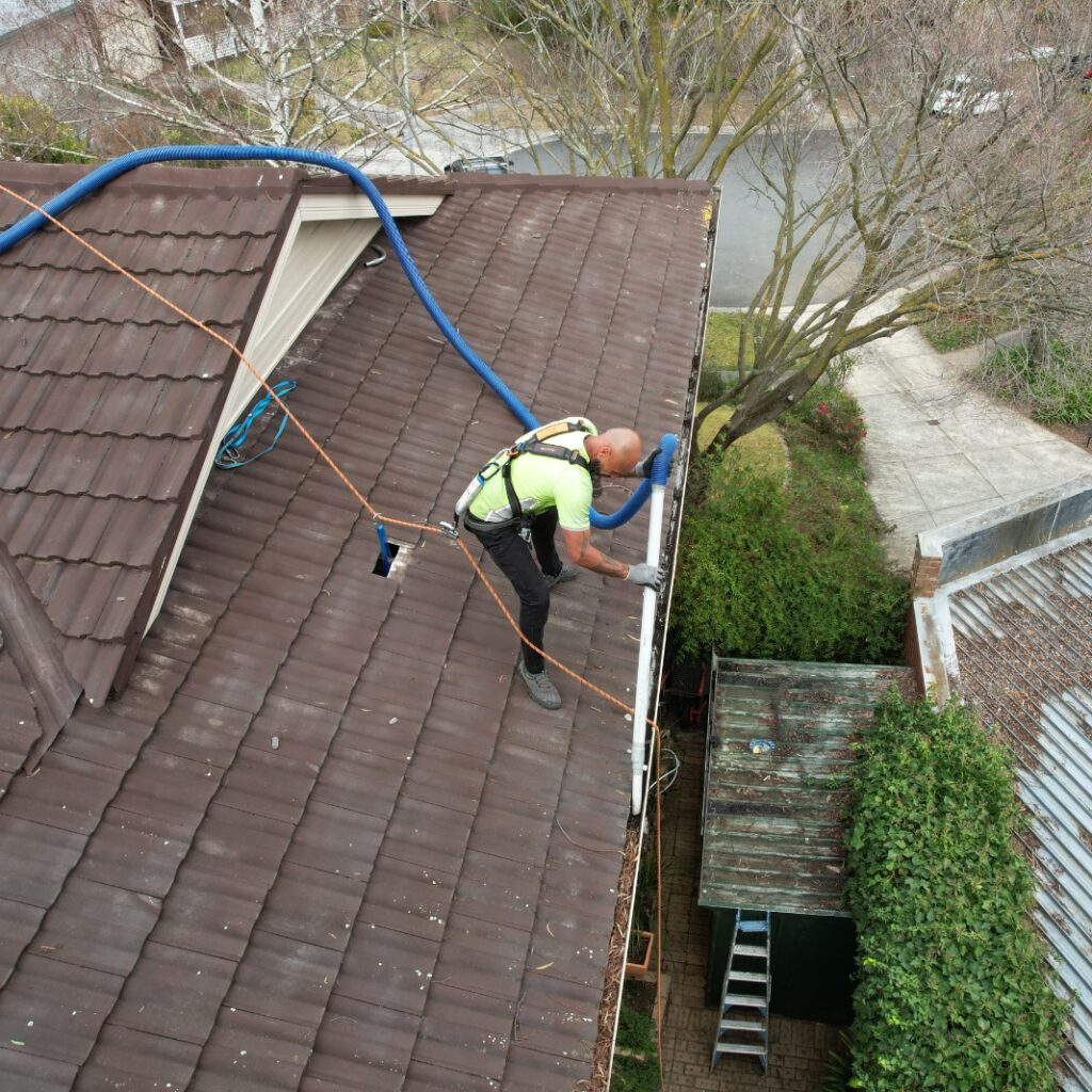 roof gutter cleaning berwick portervac employee