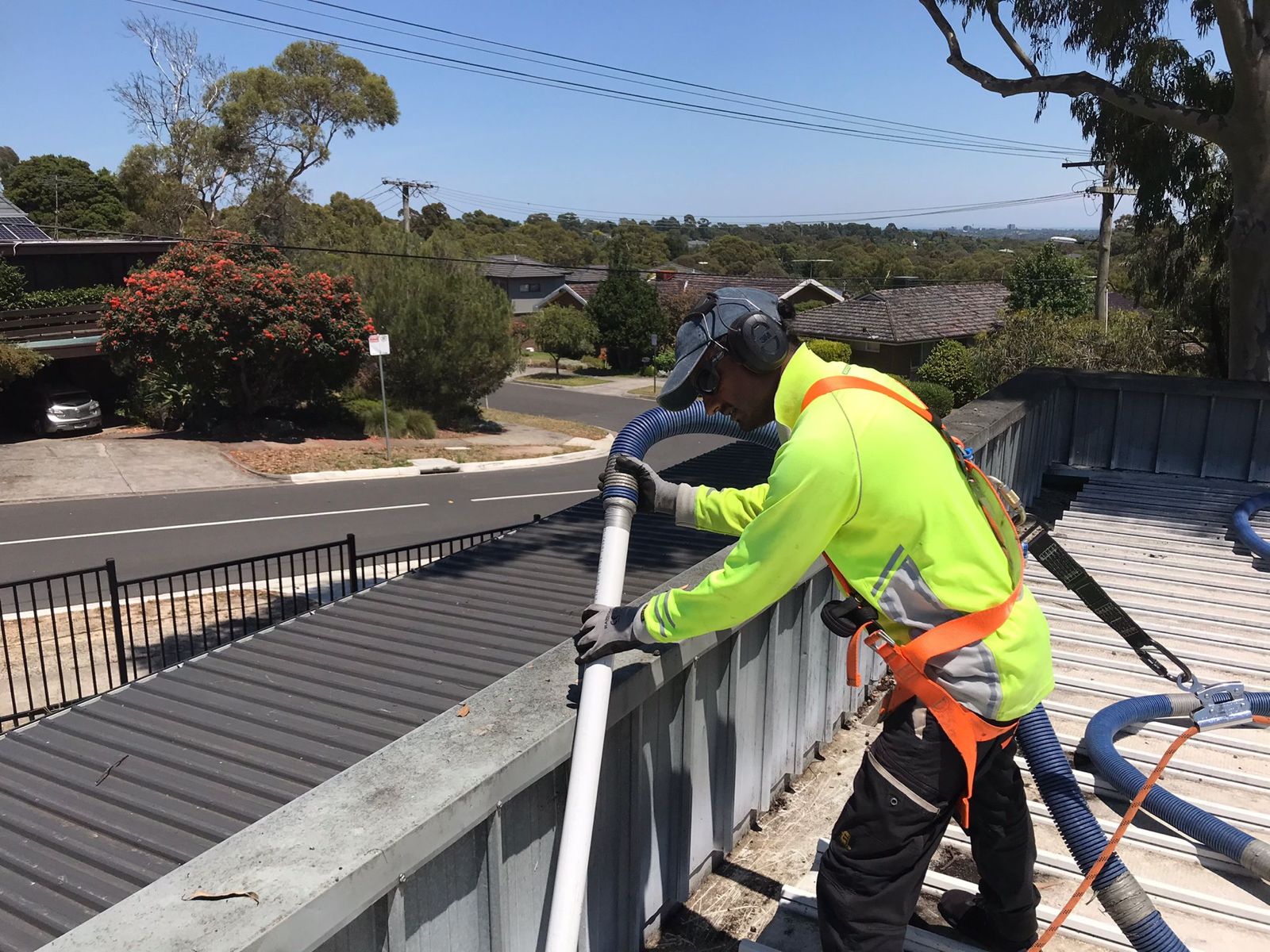 safety equipment worn by a gutter cleaner